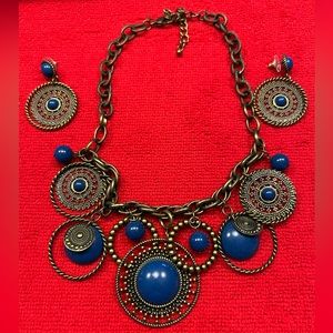Pretty bronze and blue Premiere Designs necklace and earring set.